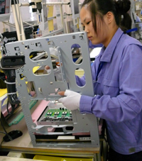 A protective metal frame is placed over the LCD panel.